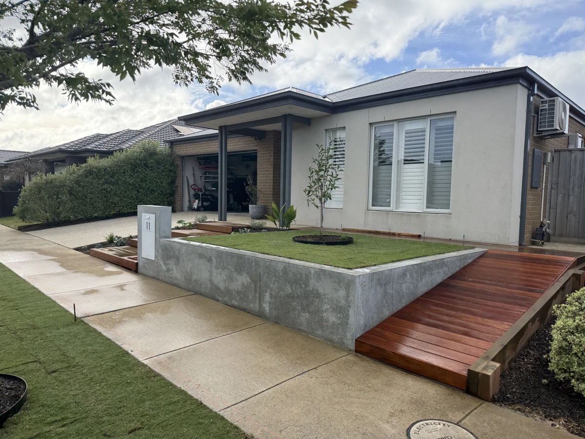 Front yard lawn with timber entry ramp