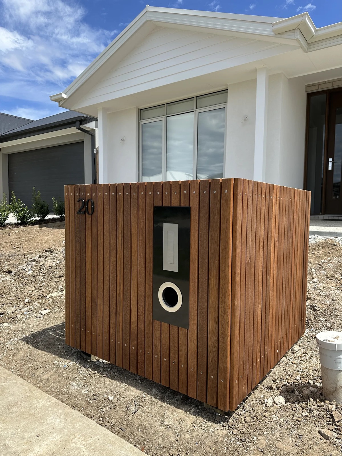 Timber clad letterbox enclosure